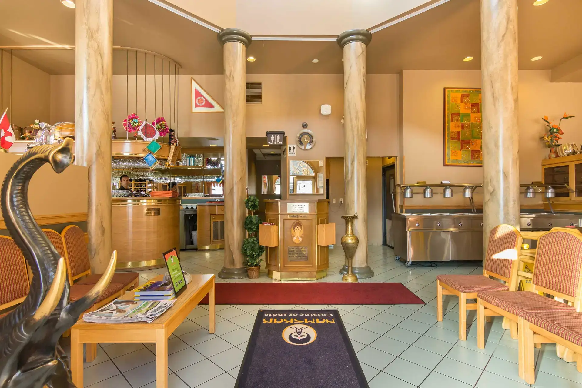 Reception, bar, and buffet area inside Namskar